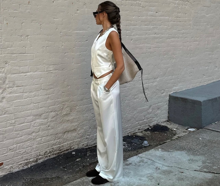 WeWoreWhat Danielle Bernstein wearing white trousers